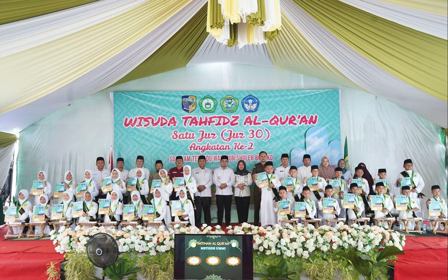 Pj Bupati Bolmut Hadiri Wisuda Tahfidz Al-Qur’an Waladun Sholeh