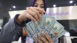 Indeks Dolar Amerika Makin Kokoh, Rupiah Menguat Tipis