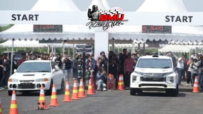 Juara Kejurda Drag Race Bolmut 2025 menerima piala penghargaan