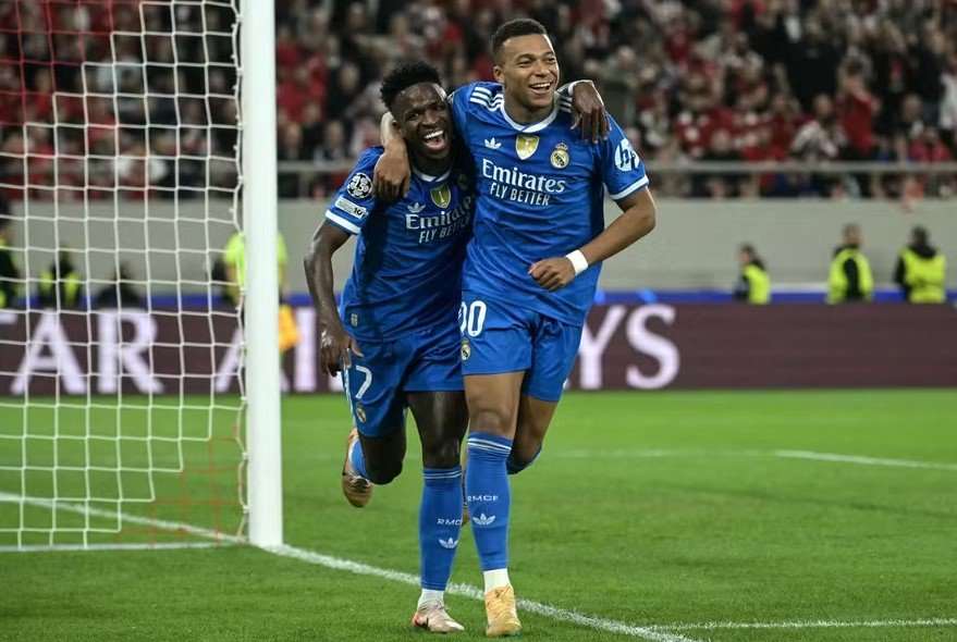 Kylian Mbappe mencetak empat gol saat Real Madrid menang 4-3 atas Olympiacos di Liga Champions